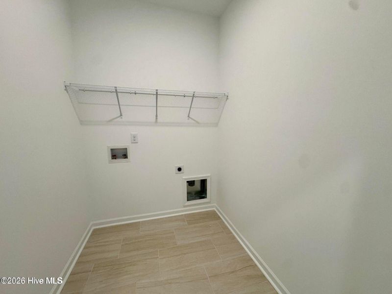 Spacious, unfurnished interior of a new home in Coastal Haven, Leland (Image 12).