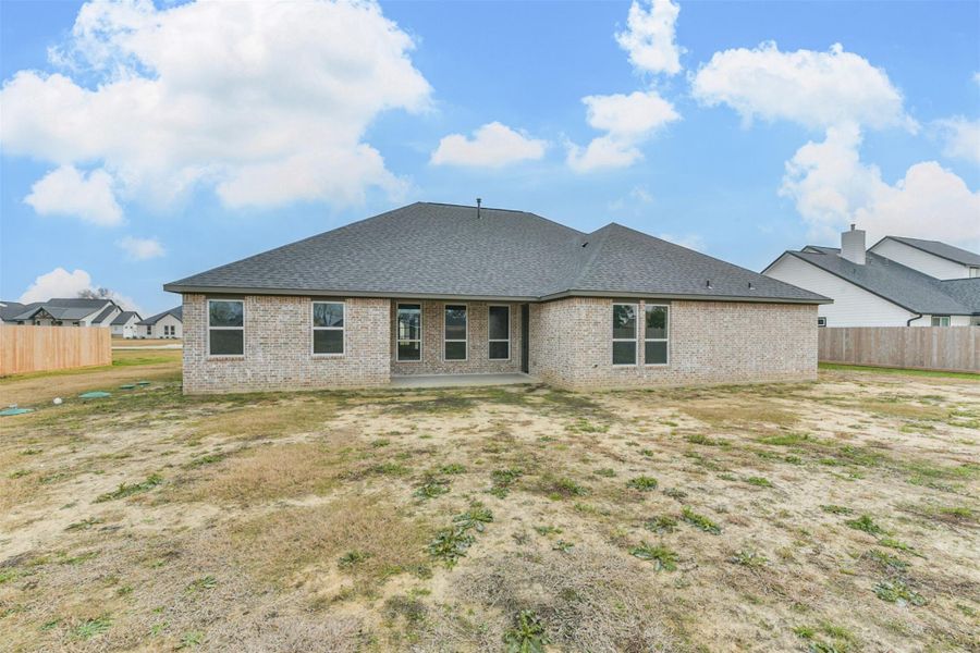 Exterior details and patio area of a home in , Baytown (Image 24).
