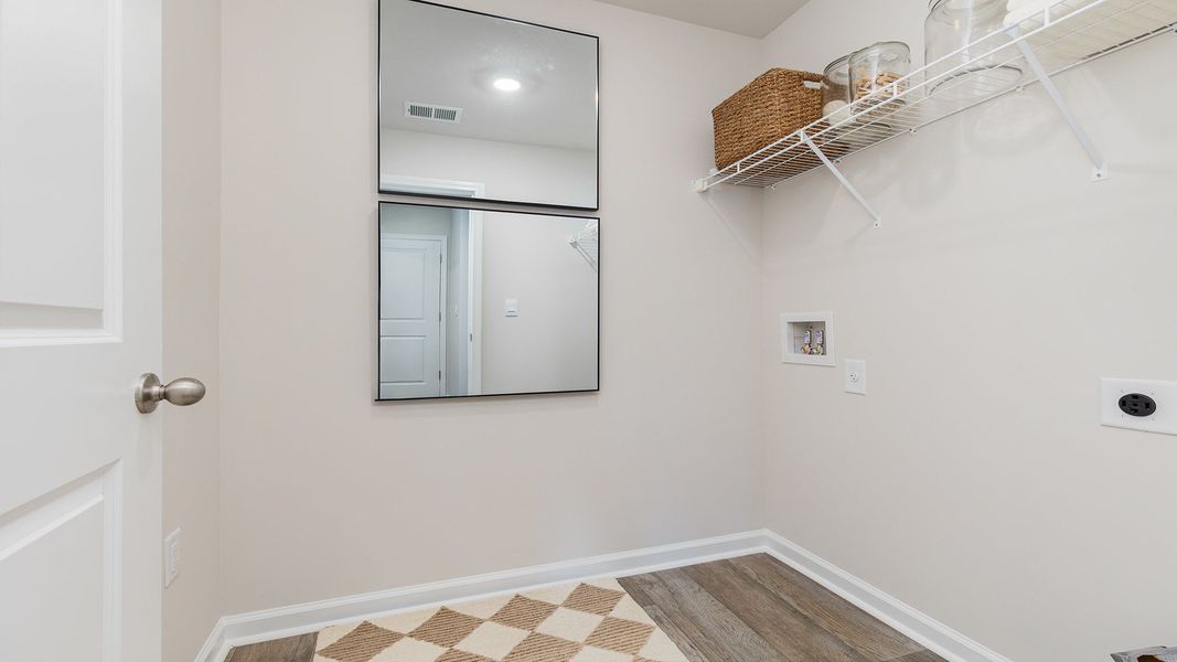 Furnished interior view inside a new home in The Meadows at Wildwood Village, Shallotte (Image 23).