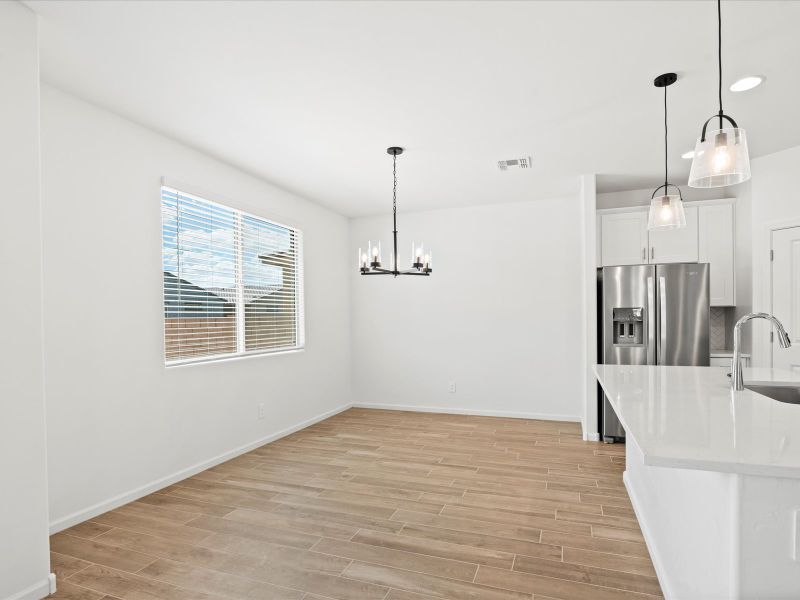 Spacious, unfurnished interior of a new home in Mandarina - Signature Series, Marana (Image 10).