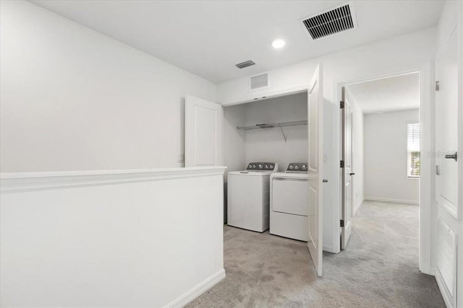 Furnished interior in a model home at The Townhomes at Azario Lakewood Ranch in Bradenton (Image 14).