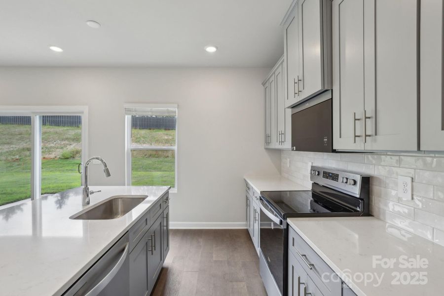 Photo is not of the actual home, but is an inspirational photo of builder’s model home and may depict options, furnishings, and/or decorator features that are not included Photo is not of the actual home, but is an inspirational photo of builder’s model home and may depict options, furnishings, and/or decorator features that are not included