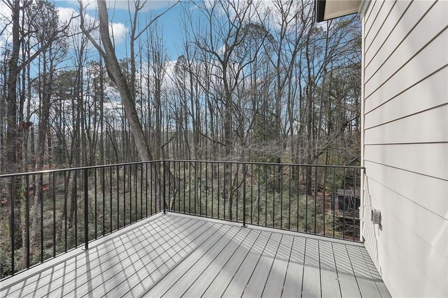 Private back deck off Primary Bedroom Sitting room space.