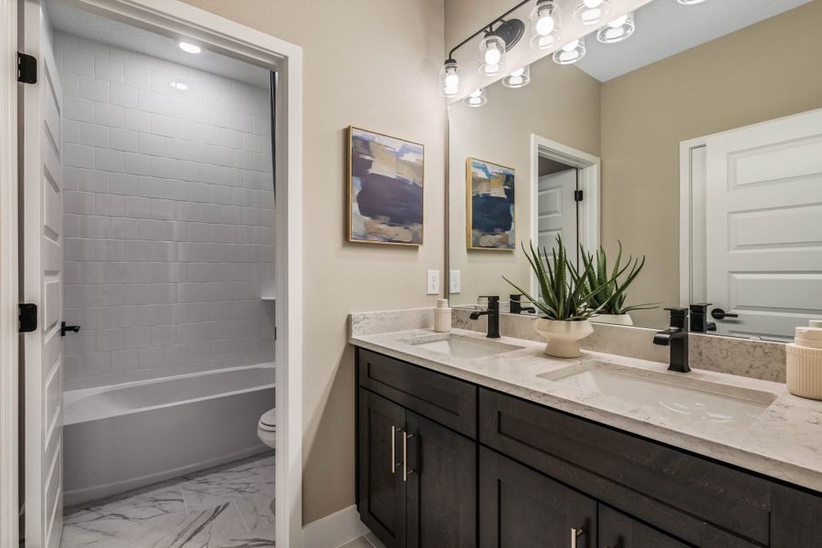 Furnished interior view inside a new home in Harvest at Ovation - Townhomes, Winter Garden (Image 34).