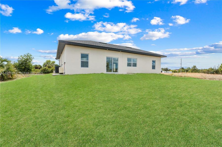 Exterior details and patio area of a home in , Lehigh Acres (Image 3).