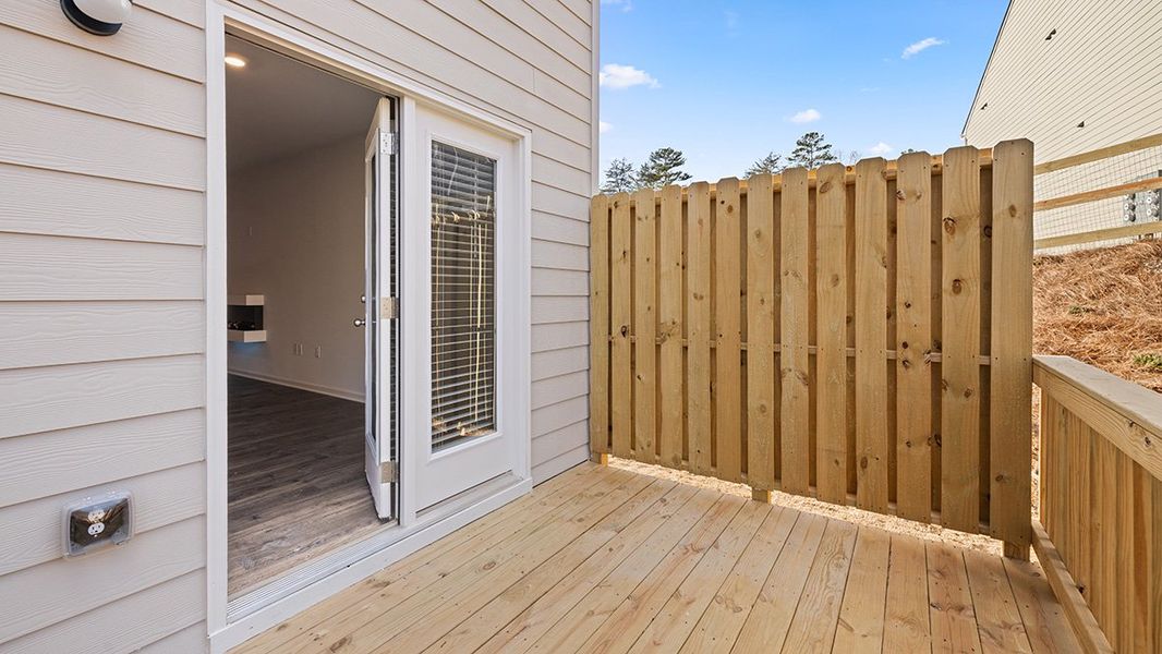 Exterior details and patio area of a home in Greyton Springs Place, Buford (Image 18).