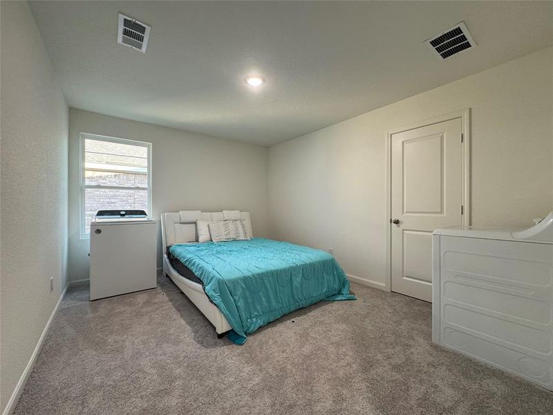 Furnished interior view inside a new home in Creekview Fossil Ridge, Pilot Point (Image 9).