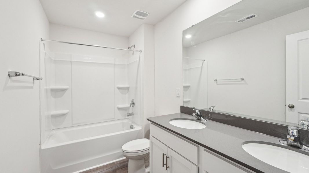 Furnished interior view inside a new home in Reedy Creek Preserve, Charlotte (Image 9).