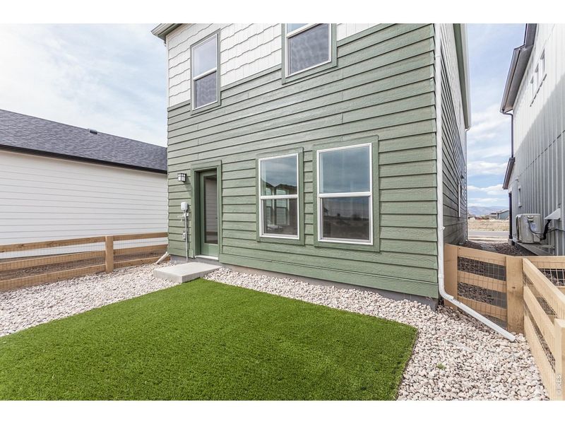 Exterior details and patio area of a home in Bloom Trailblazer Collection - Single Family Homes, Fort Collins (Image 27).
