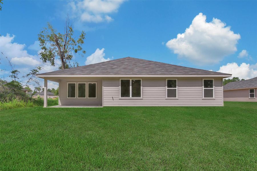 Front exterior of a new home in Williams Reserve East, Conroe, TX, highlighting curb appeal (Image 15).