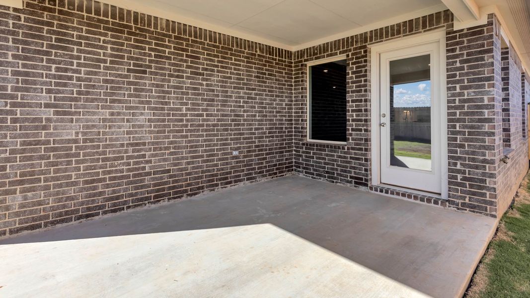 Exterior details and patio area of a home in Overlook West, Wolfforth (Image 2). Exterior details and patio area of a home in Overlook West, Wolfforth (Image 2).