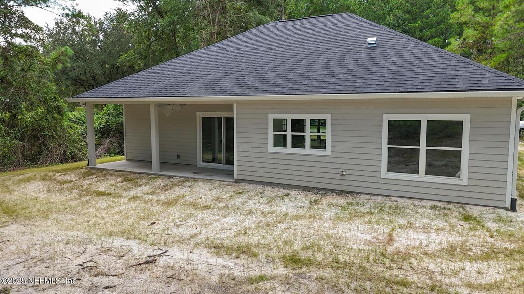 Front exterior of a new home in , Melrose, FL, highlighting curb appeal (Image 19).