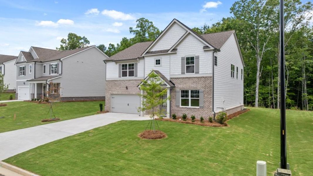 Front exterior of a new home in Parkside at Carter Grove, Cartersville, GA, highlighting curb appeal (Image 16).
