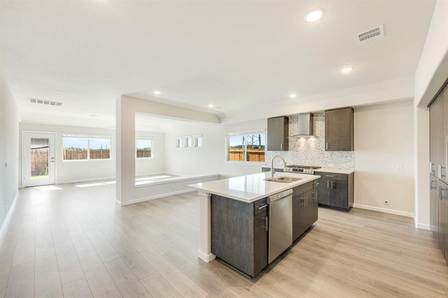 Furnished interior view inside a new home in East Oak Creek Elements, Commerce (Image 8).