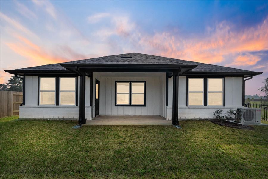 Exterior details and patio area of a home in Montgomery Ridge, Montgomery (Image 4).