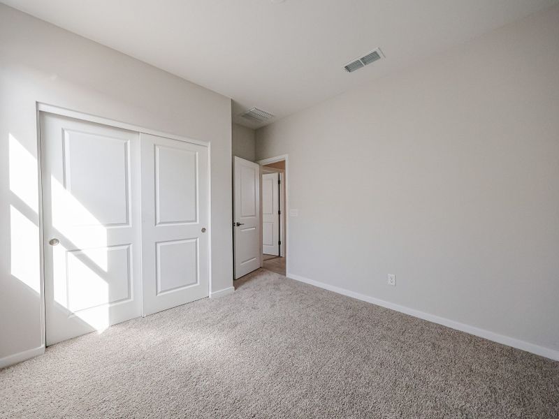 A room with white doors.