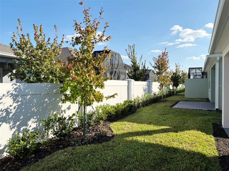 Exterior details and patio area of a home in Del Webb Oasis, Winter Garden (Image 26).