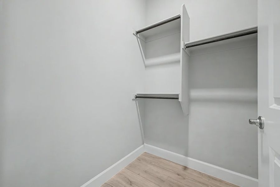 Spacious, unfurnished interior of a new home in Bellero Estates, Queen Creek (Image 30).