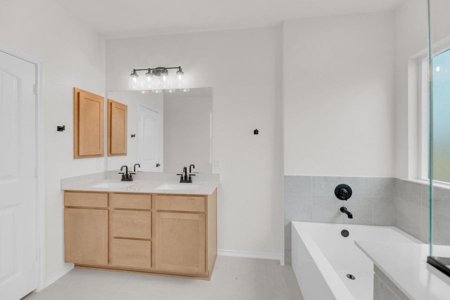 Furnished interior view inside a new home in Mustang Valley, Manor (Image 6). Furnished interior view inside a new home in Mustang Valley, Manor (Image 6).