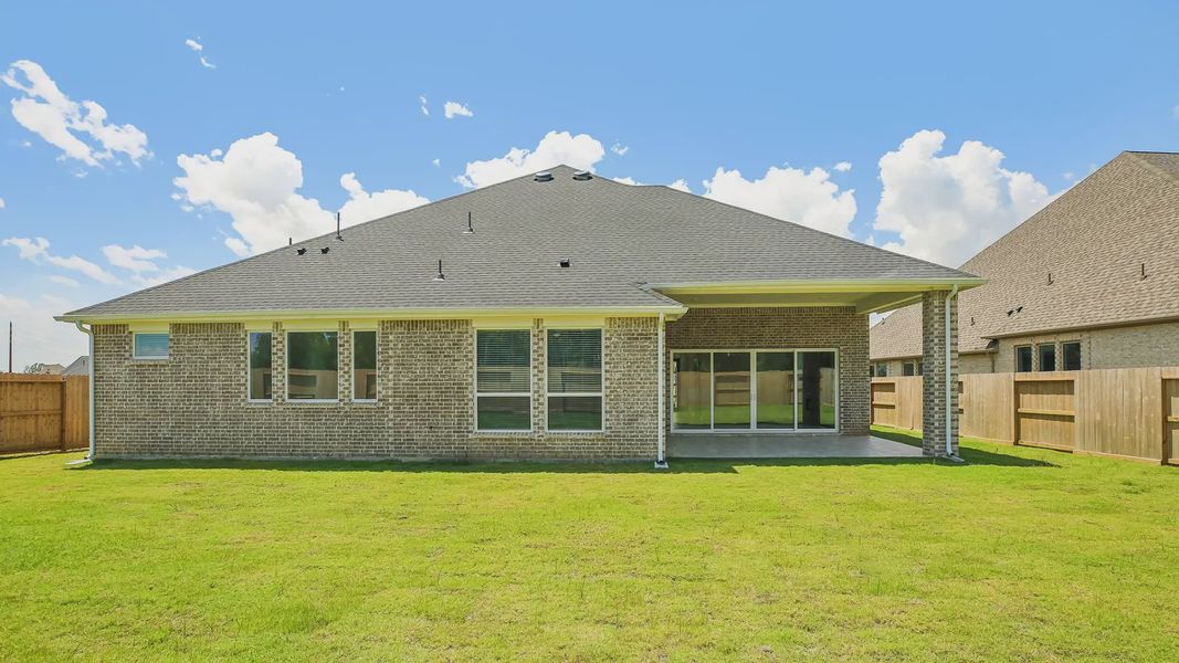 Exterior details and patio area of a home in Riceland 60',65',70', Mont Belvieu (Image 27).