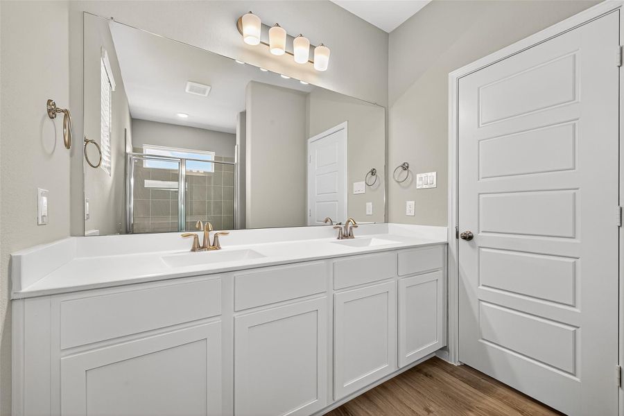 Furnished interior view inside a new home in Sunterra, Katy (Image 11).