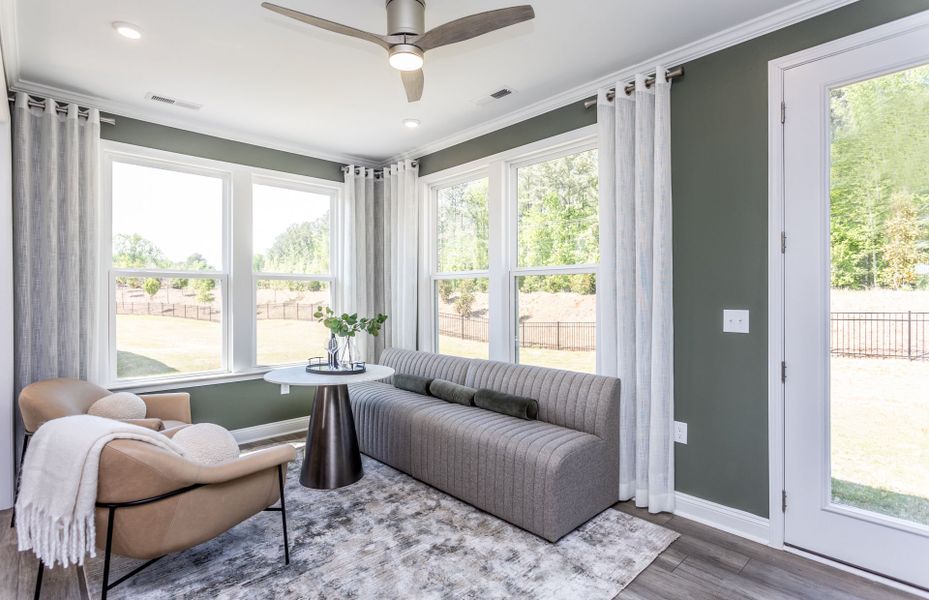Bright & Airy Sunroom Accommodates More Seating