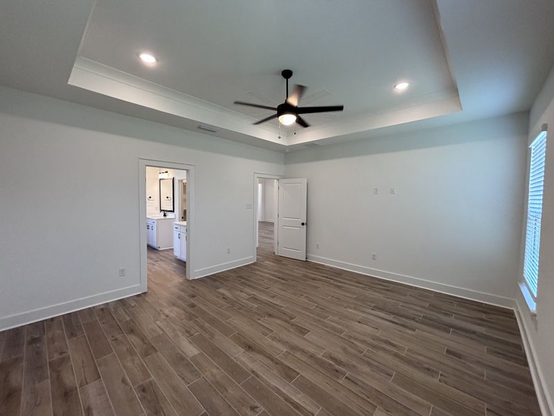 Spacious, unfurnished interior of a new home in Bird Song at Hammock Bay, Freeport (Image 22).