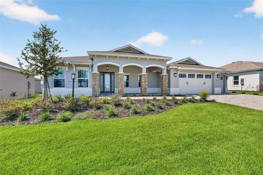 Front exterior of a new home in , Ocala, FL, highlighting curb appeal (Image 26).