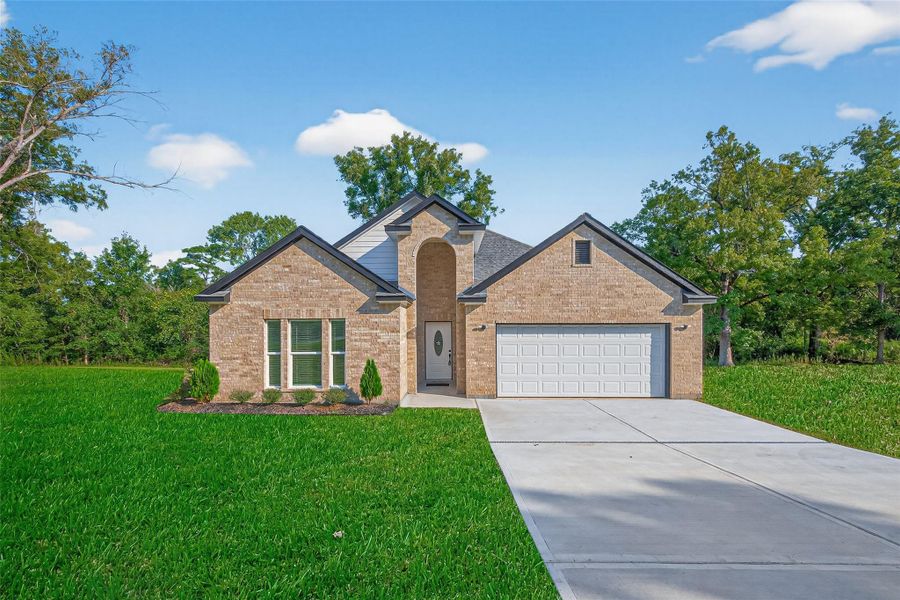 Front exterior of a new home in , Kenefick, TX, highlighting curb appeal (Image 24). Front exterior of a new home in , Kenefick, TX, highlighting curb appeal (Image 24).