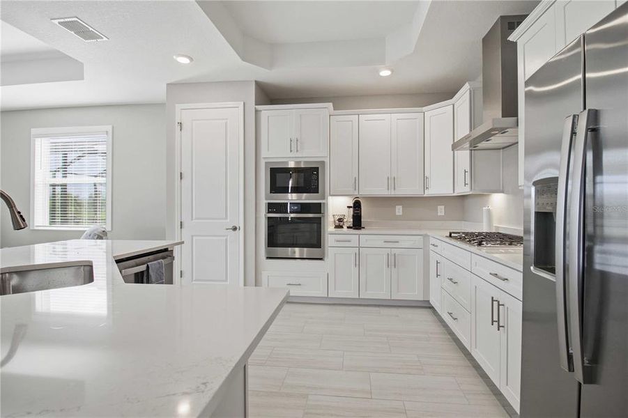 Furnished interior view inside a new home in Calusa Country Club, Lakewood Ranch (Image 37).