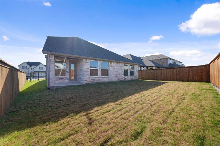 Exterior details and patio area of a home in Brookhollow West, Prosper (Image 3).