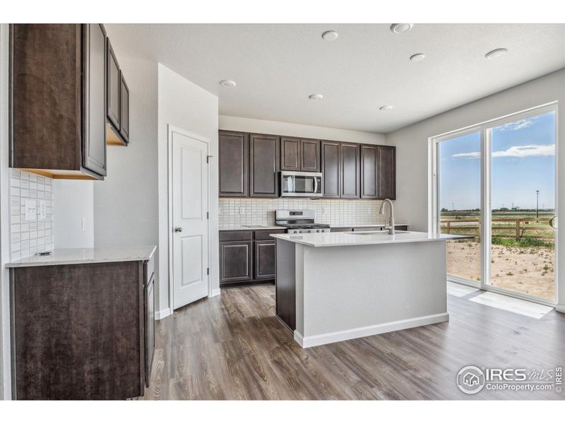 Furnished interior view inside a new home in Prairie Song, Windsor (Image 7).