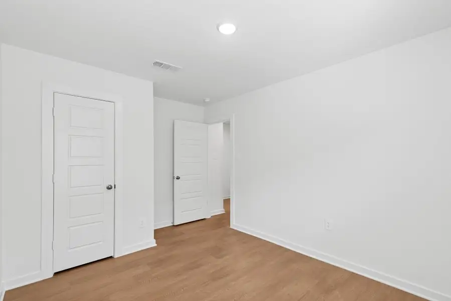 Spacious, unfurnished interior of a new home in Pinewood at Grand Texas, New Caney (Image 5).