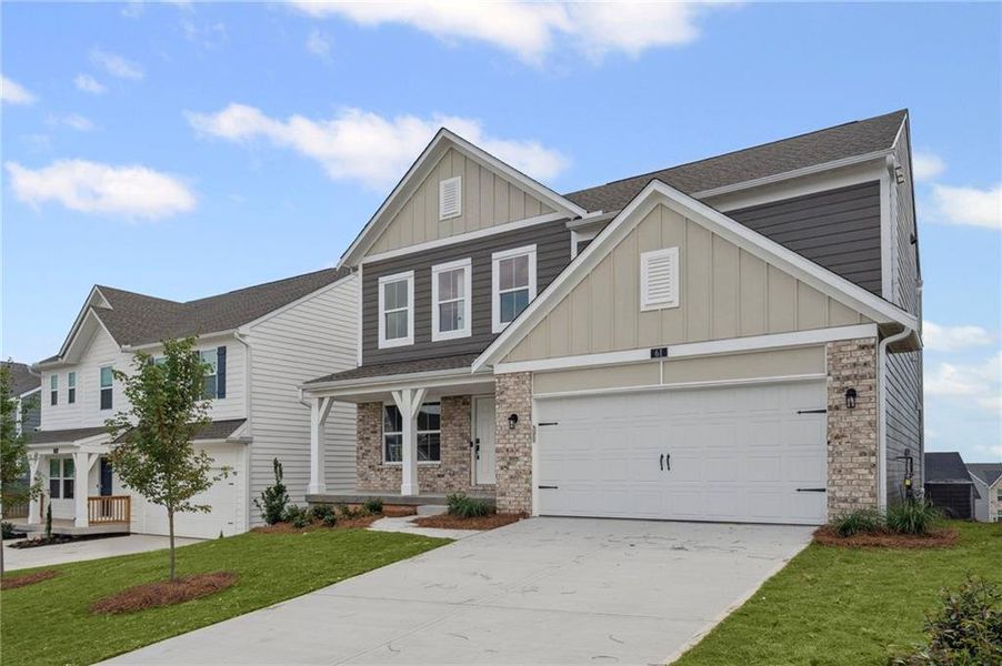 Front exterior of a new home in Twin Lakes, Braselton, GA, highlighting curb appeal (Image 21).