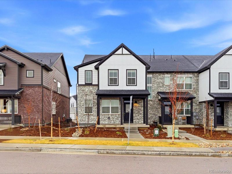 Front exterior of a new home in , Aurora, CO, highlighting curb appeal (Image 20).