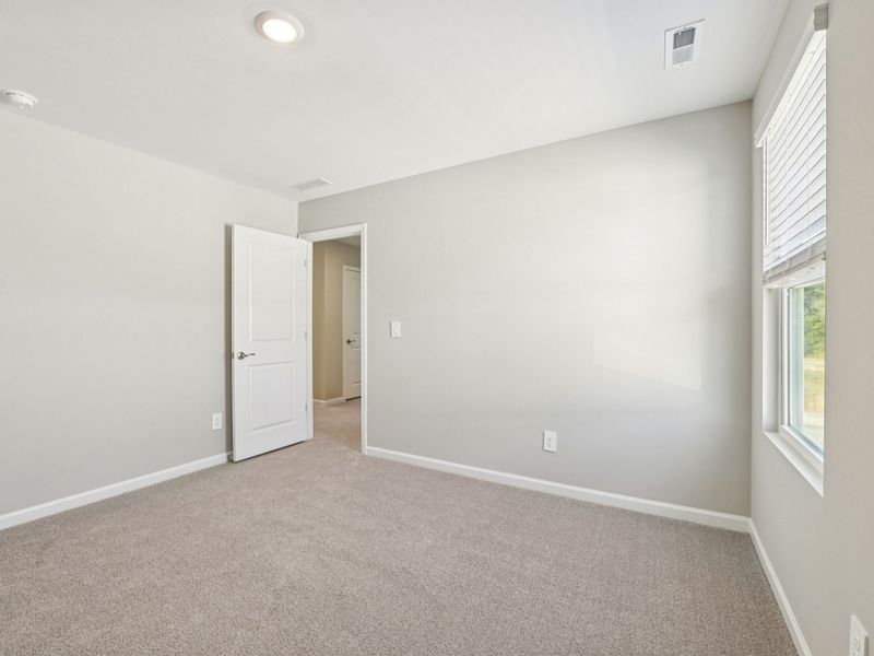 Spacious, unfurnished interior of a new home in Watkins Glen, Raleigh (Image 21).