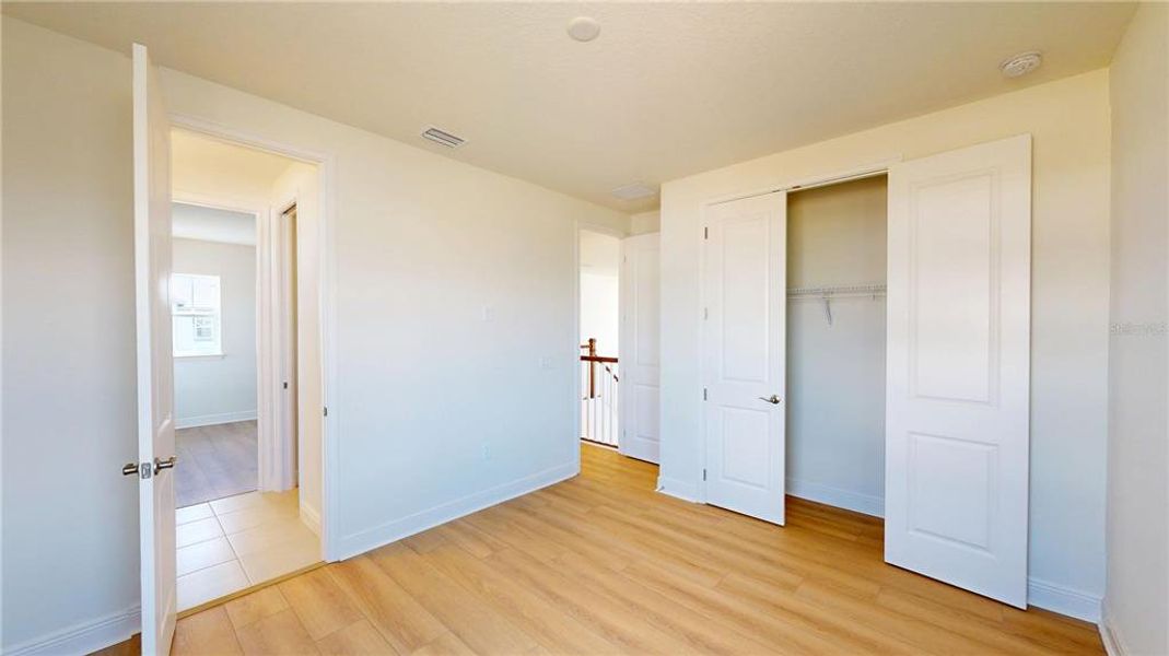 Spacious, unfurnished interior of a new home in Laureate Park, Orlando (Image 15).