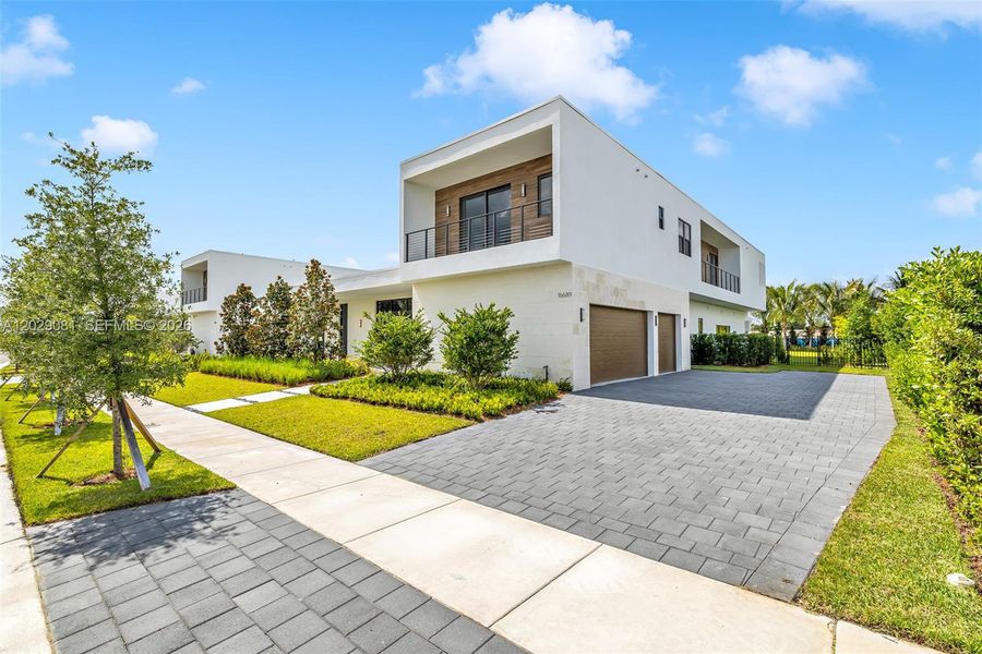 Front exterior of a new home in , Weston, FL, highlighting curb appeal (Image 24).