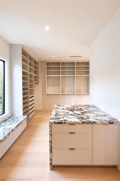 Primary closet is sure to wow.