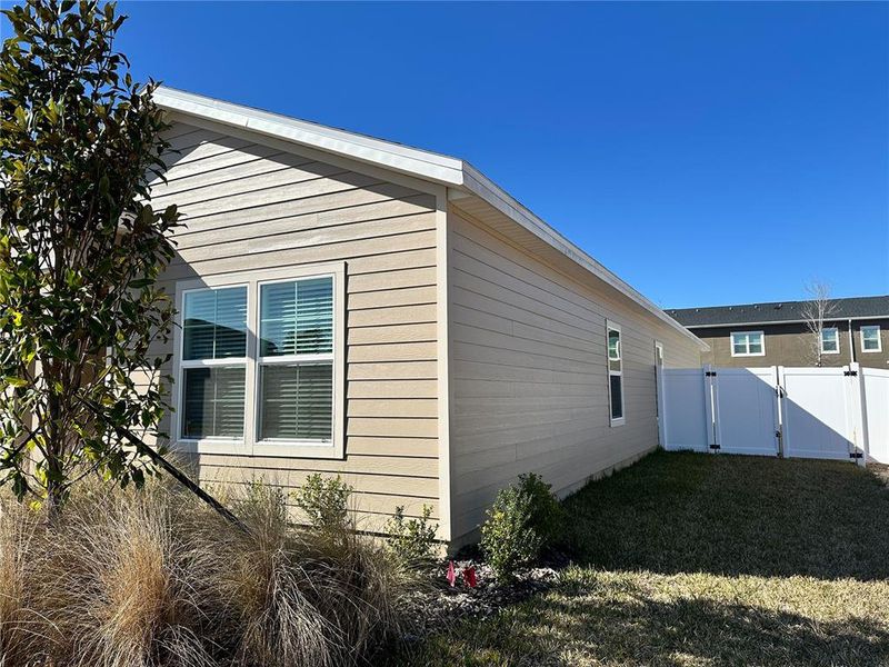 Exterior details and patio area of a home in Pioneer Ranch, Ocala (Image 32).