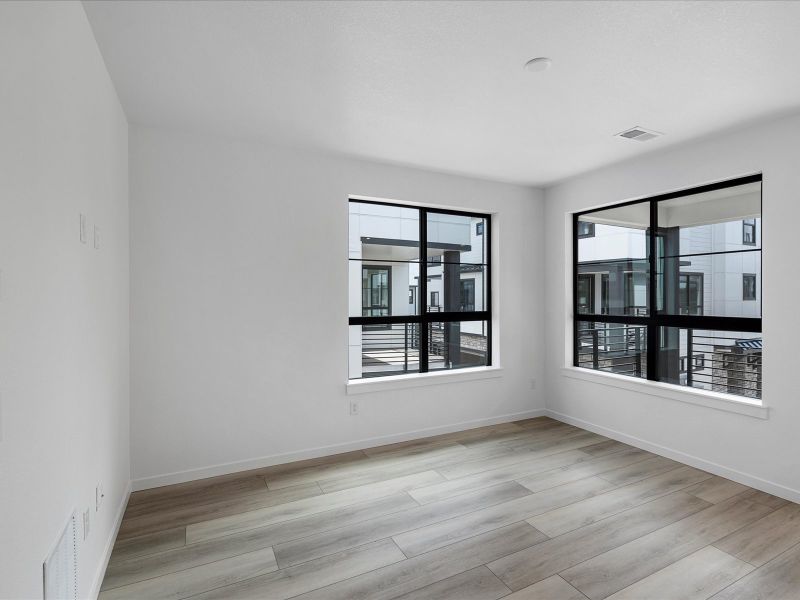 Spacious, unfurnished interior of a new home in The Hub at Virginia Village, Denver (Image 14).