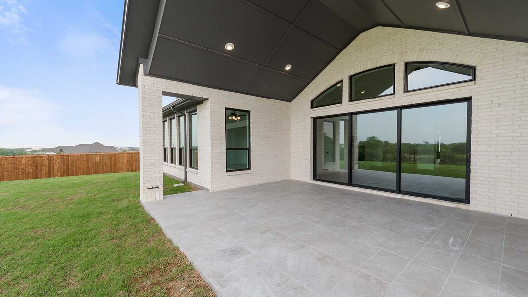 Exterior details and patio area of a home in Sweetgrass, Haslet (Image 3).