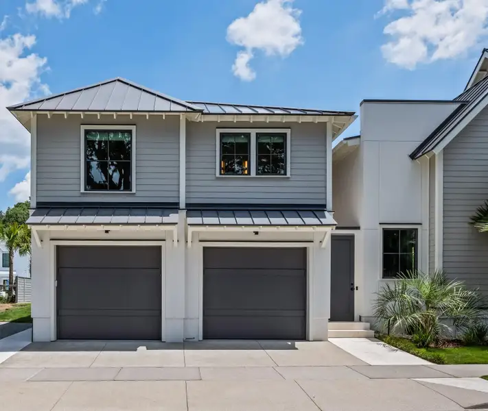 Front exterior of a new home in , Mount Pleasant, SC, highlighting curb appeal (Image 2). Front exterior of a new home in , Mount Pleasant, SC, highlighting curb appeal (Image 2).