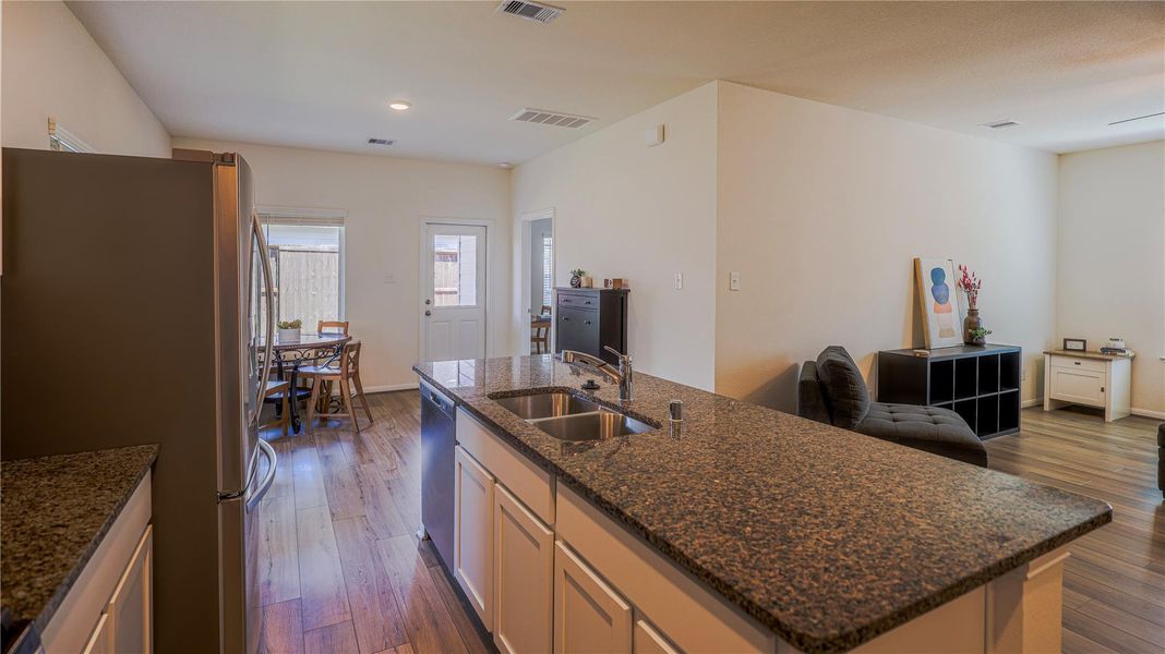 Furnished interior view inside a new home in Woodshore, Clute (Image 5).