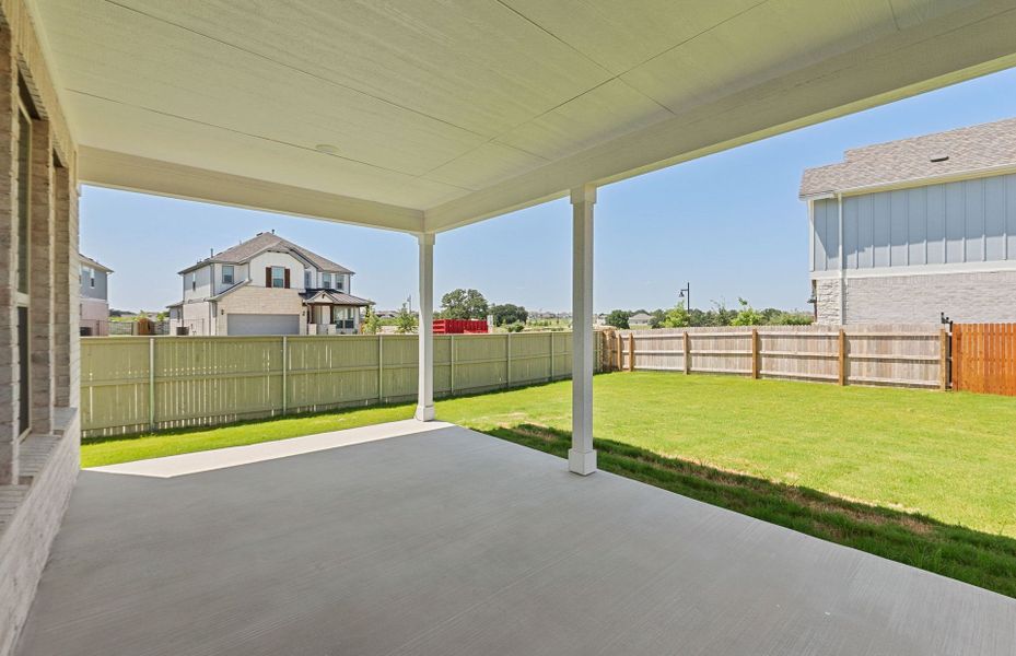 Exterior details and patio area of a home in Santa Rita Ranch, Liberty Hill (Image 30).