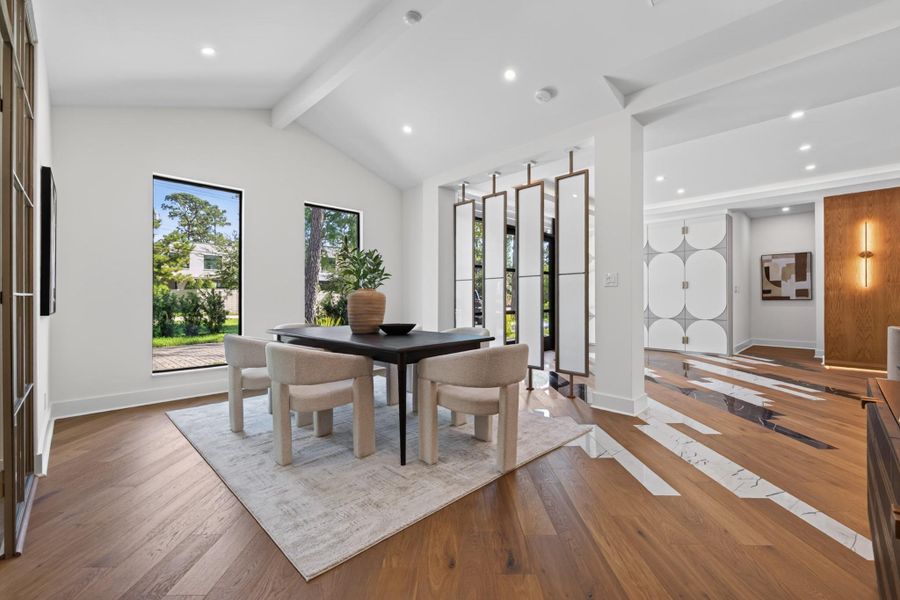 Elegant dining area enjoys abundant natural light and a seamless connection to the main living spaces.