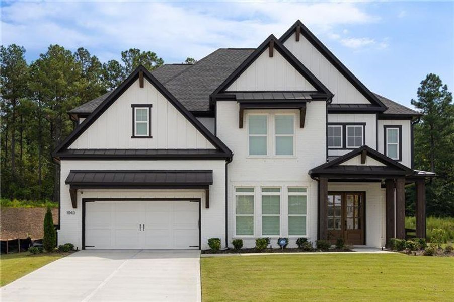 Front exterior of a new home in , Woodstock, GA, highlighting curb appeal (Image 1).