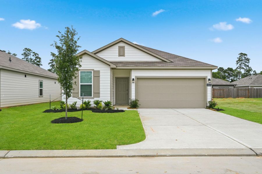 Front exterior of a new home in Crockett Meadows, Conroe, TX, highlighting curb appeal (Image 17).