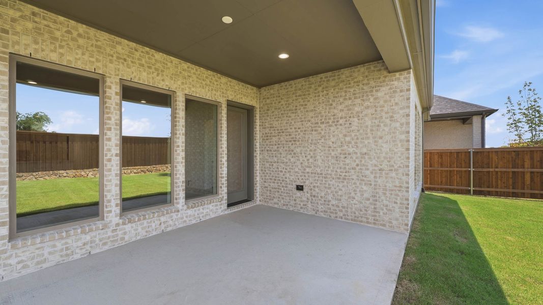 Exterior details and patio area of a home in Trinity Falls, McKinney (Image 4). Exterior details and patio area of a home in Trinity Falls, McKinney (Image 4).