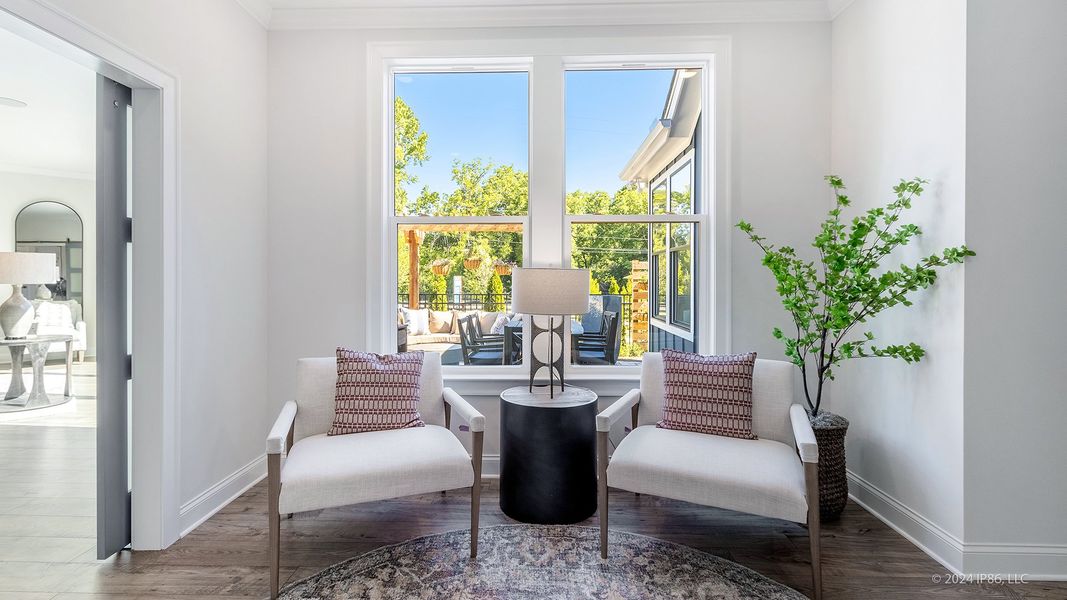 Representative furnished interior of a home built from the Promenade by Epcon Communities in The Courtyards at Bailey Farms, Dacula (Image 16).